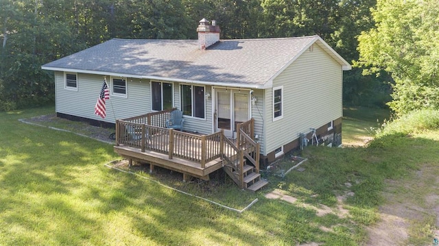 4043 Rehbein Rd, Duluth, MN 55803 - back of property featuring a shingled roof, a chimney, and a yard