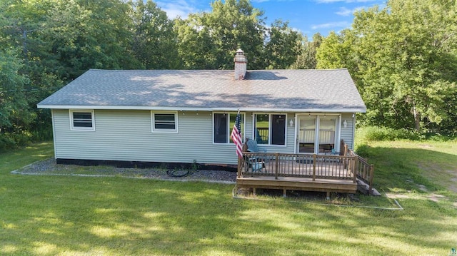 4043 Rehbein Rd, Duluth, MN 55803 - view of front facade featuring a deck, a front yard, a chimney, and roof with shingles