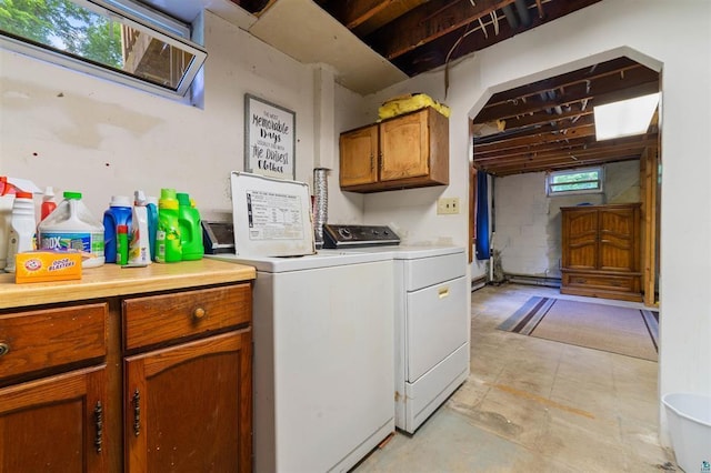 4043 Rehbein Rd, Duluth, MN 55803 - laundry area featuring independent washer and dryer and cabinet space