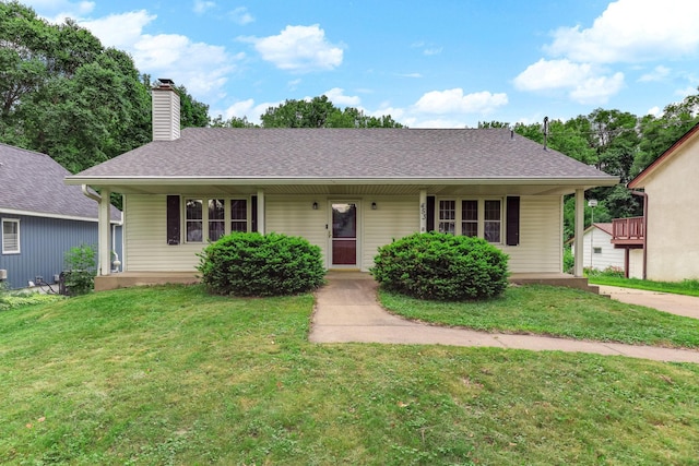 453 Van Dyke St, Saint Paul, MN 55119 - ranch-style house featuring a front lawn and a chimney