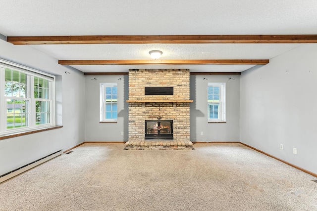 453 Van Dyke St, Saint Paul, MN 55119 - unfurnished living room featuring a baseboard heating unit, healthy amount of natural light, carpet flooring, and beam ceiling
