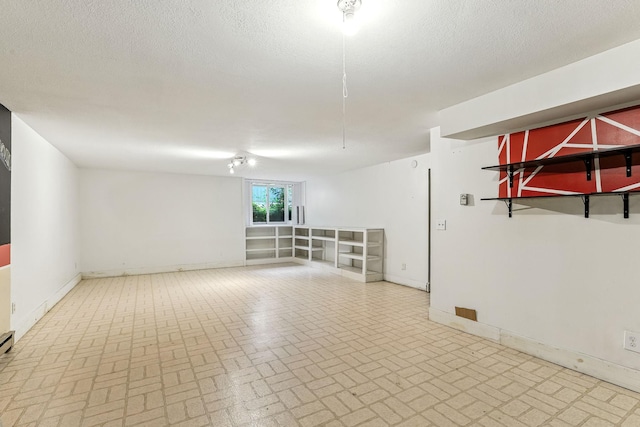 453 Van Dyke St, Saint Paul, MN 55119 - spare room with brick patterned floors and baseboards