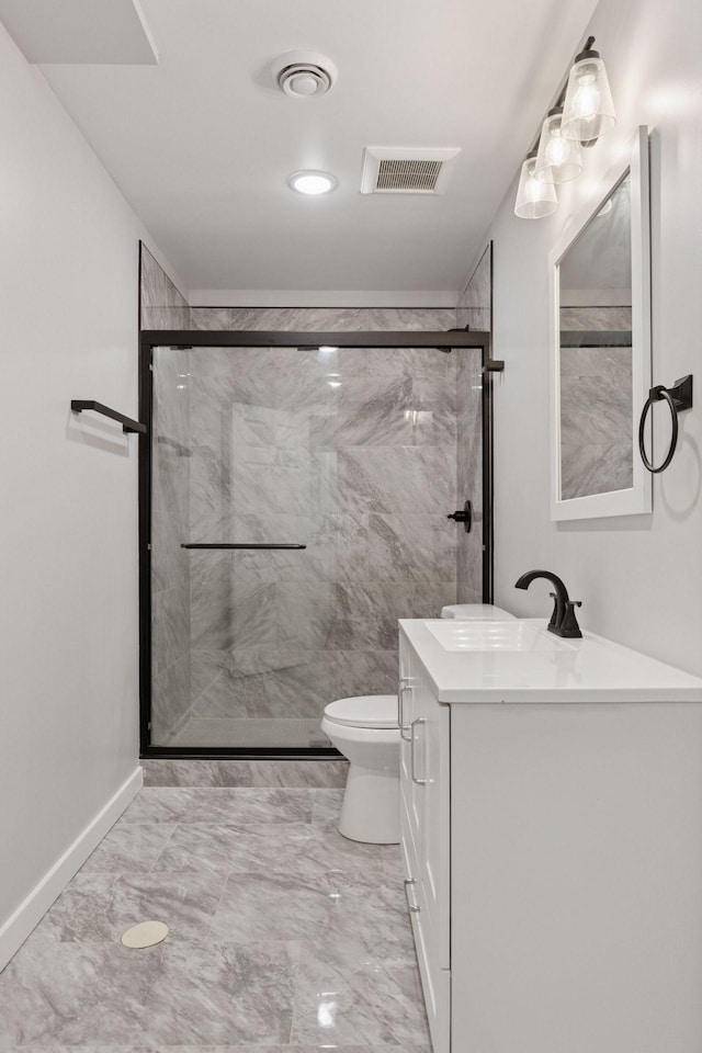 4116 River Run, Savage, MN 55378 - bathroom featuring vanity, marble look tile flooring, and a marble finish shower