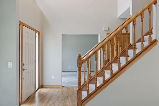 4116 River Run, Savage, MN 55378 - entrance foyer featuring wood finished floors and stairway