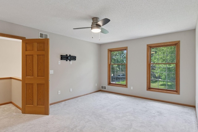 4116 River Run, Savage, MN 55378 - carpeted empty room with a ceiling fan and a textured ceiling