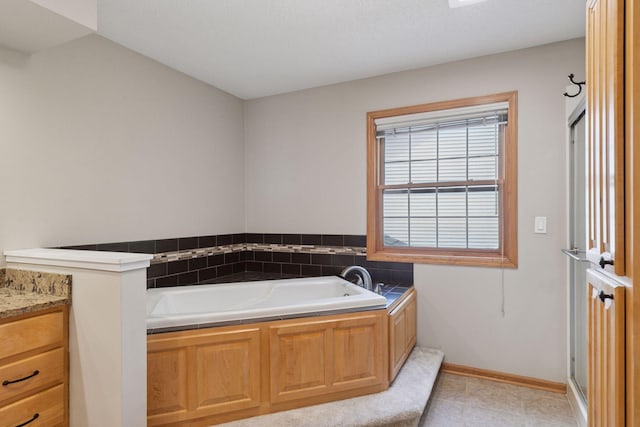 4116 River Run, Savage, MN 55378 - bathroom featuring a garden tub and vanity