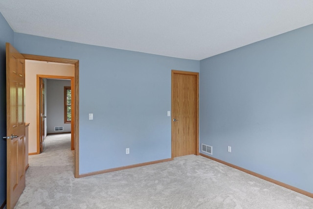 4116 River Run, Savage, MN 55378 - unfurnished bedroom featuring light carpet and baseboards