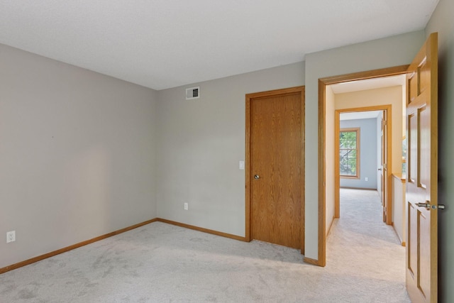 4116 River Run, Savage, MN 55378 - empty room featuring light colored carpet and baseboards