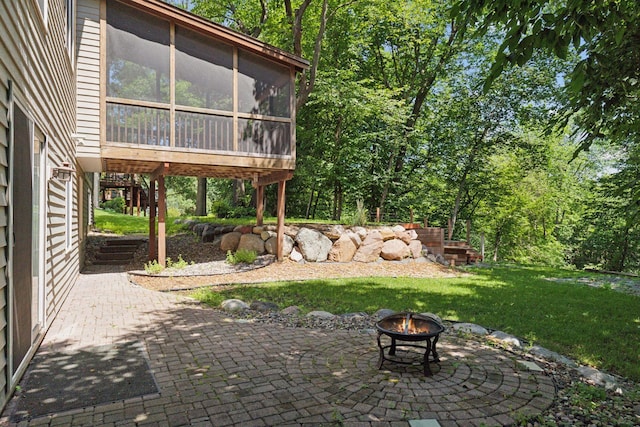 4116 River Run, Savage, MN 55378 - view of patio with an outdoor fire pit and a sunroom
