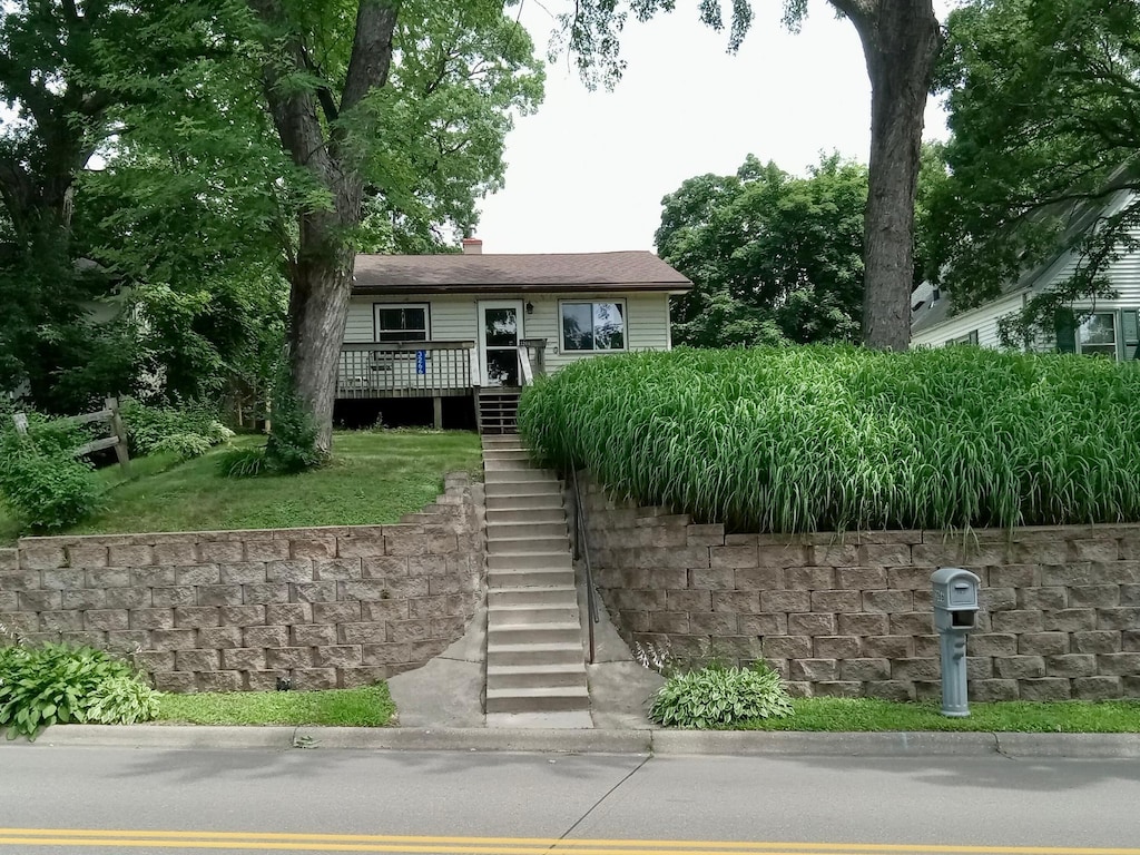 3266 Owasso Blvd, Shoreview, MN 55126 - view of front facade featuring stairway and a deck