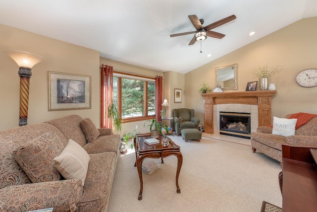 2045 Roberta Dr, North Mankato, MN 56003 - carpeted living room featuring lofted ceiling, ceiling fan, a fireplace, and recessed lighting