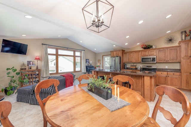 2045 Roberta Dr, North Mankato, MN 56003 - dining space featuring vaulted ceiling, recessed lighting, and a chandelier