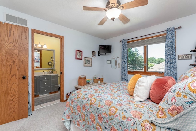 2045 Roberta Dr, North Mankato, MN 56003 - bedroom featuring carpet floors, a ceiling fan, and ensuite bath