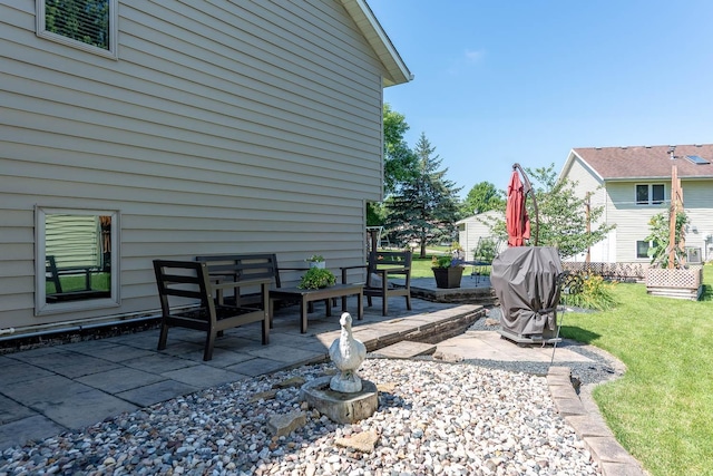 2045 Roberta Dr, North Mankato, MN 56003 - view of patio featuring a grill