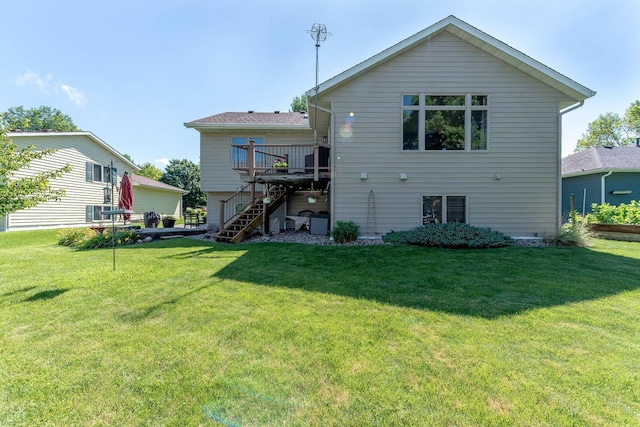2045 Roberta Dr, North Mankato, MN 56003 - rear view of house featuring stairs, a deck, and a lawn