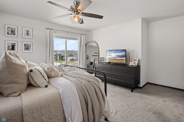 1592 69th Ave S, Fargo, ND 58104 - carpeted bedroom with a ceiling fan and access to exterior