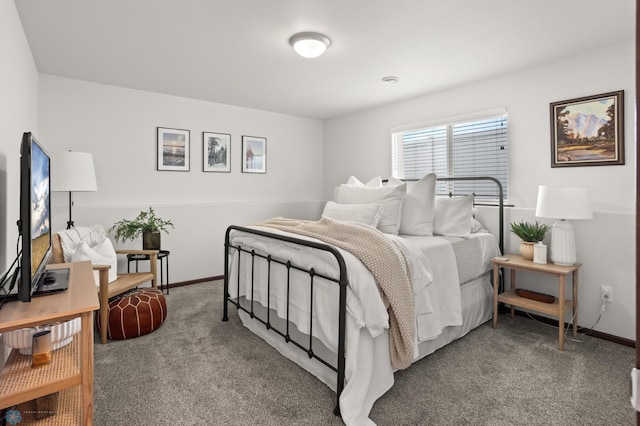 1592 69th Ave S, Fargo, ND 58104 - carpeted bedroom featuring baseboards