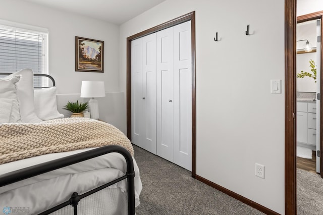 1592 69th Ave S, Fargo, ND 58104 - bedroom with a closet and dark colored carpet