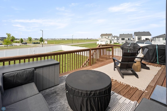 1592 69th Ave S, Fargo, ND 58104 - wooden deck with a fenced backyard and a residential view