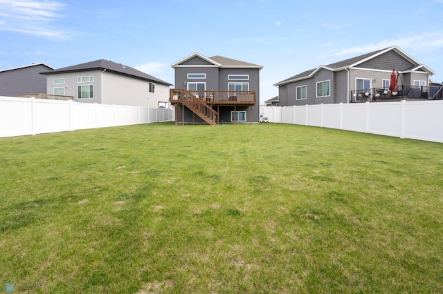 1592 69th Ave S, Fargo, ND 58104 - rear view of house featuring stairs, a deck, and a fenced backyard