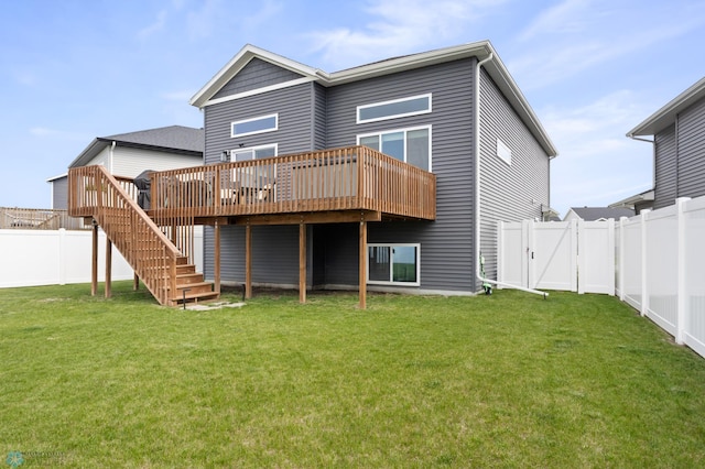 1592 69th Ave S, Fargo, ND 58104 - rear view of property with a deck, a fenced backyard, a gate, and stairway