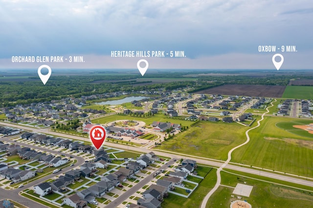 1592 69th Ave S, Fargo, ND 58104 - aerial view of residential area featuring a nearby body of water