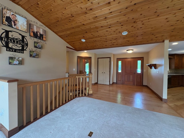53030 254th Ave, Plainview Twp, MN 55964 - entrance foyer featuring vaulted ceiling, light colored carpet, wooden ceiling, light wood-style flooring, and recessed lighting
