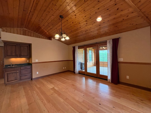 53030 254th Ave, Plainview Twp, MN 55964 - unfurnished living room featuring vaulted ceiling, a chandelier, wooden ceiling, and light wood-style flooring