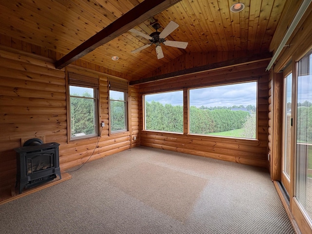 53030 254th Ave, Plainview Twp, MN 55964 - unfurnished sunroom with a wood stove, vaulted ceiling, and plenty of natural light