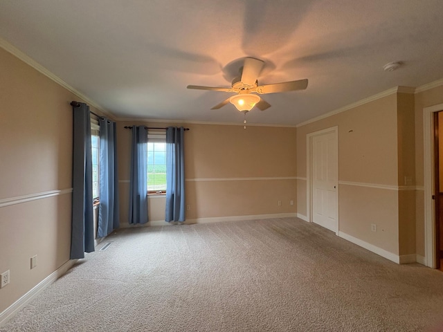 53030 254th Ave, Plainview Twp, MN 55964 - unfurnished room with crown molding, light carpet, ceiling fan, and a smoke detector