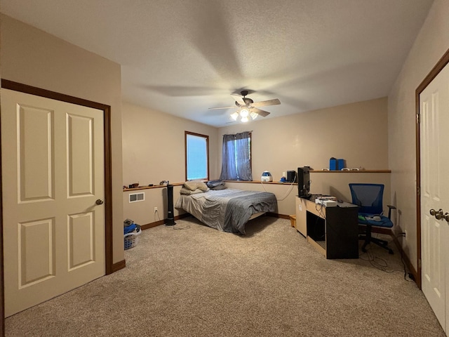 53030 254th Ave, Plainview Twp, MN 55964 - bedroom with carpet flooring, ceiling fan, and a desk