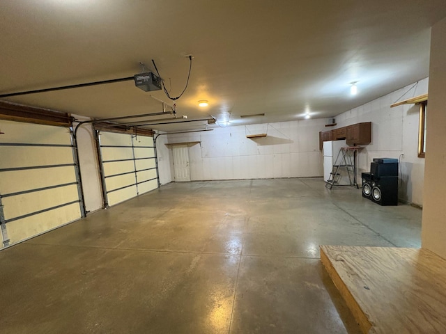 53030 254th Ave, Plainview Twp, MN 55964 - garage with a garage door opener and freestanding refrigerator