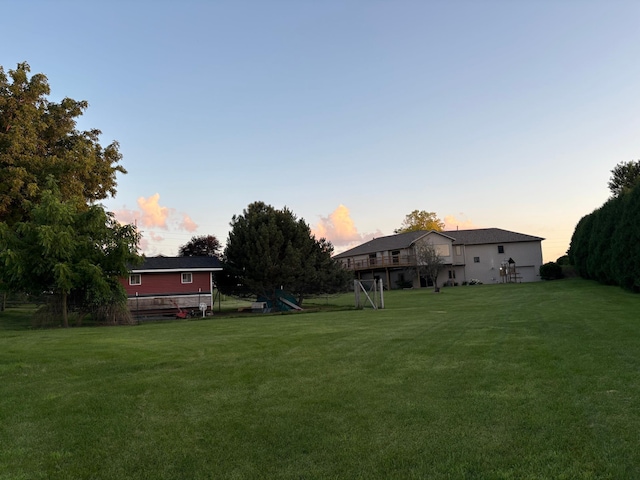 53030 254th Ave, Plainview Twp, MN 55964 - view of green lawn featuring a deck and a playground