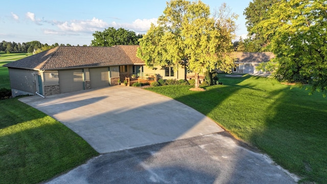 53030 254th Ave, Plainview Twp, MN 55964 - ranch-style house featuring concrete driveway, a garage, a front yard, and stone siding