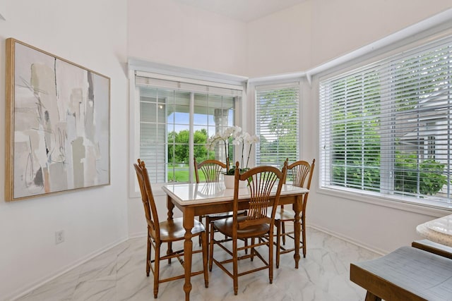 3725 Archer Ln N, Plymouth, MN 55446 - dining space featuring light marble finish floors and baseboards