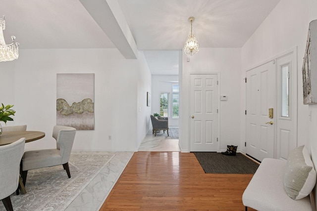 3725 Archer Ln N, Plymouth, MN 55446 - foyer featuring a chandelier and wood finished floors