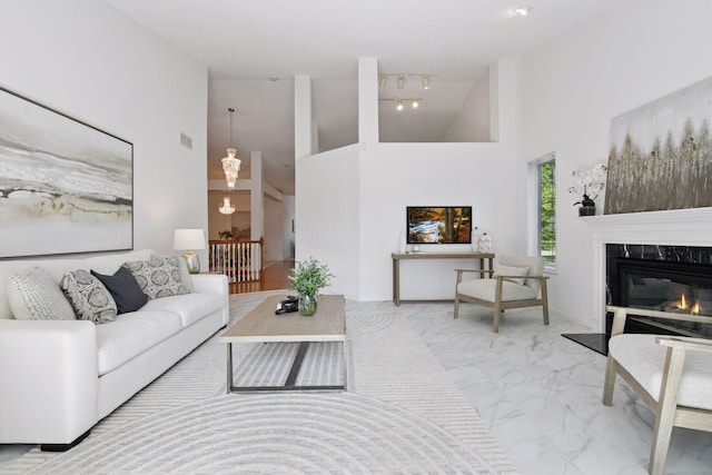 3725 Archer Ln N, Plymouth, MN 55446 - living area with high vaulted ceiling, marble finish floors, and a fireplace