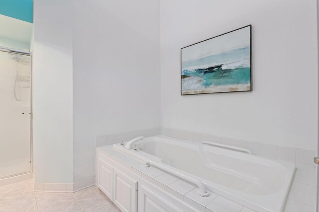 3725 Archer Ln N, Plymouth, MN 55446 - bathroom featuring a garden tub, a shower stall, and tile patterned flooring