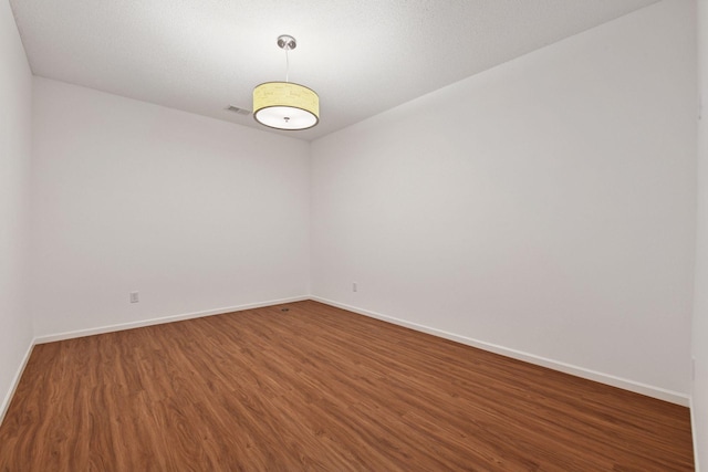 3725 Archer Ln N, Plymouth, MN 55446 - unfurnished room with baseboards and wood finished floors