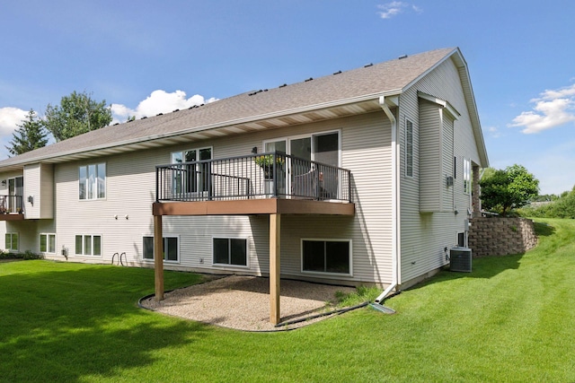 3725 Archer Ln N, Plymouth, MN 55446 - back of property with a lawn, roof with shingles, and a patio area