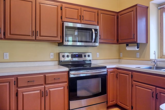 20730 Glenbrook Ave N, Forest Lake, MN 55025 - kitchen featuring stainless steel appliances and light countertops