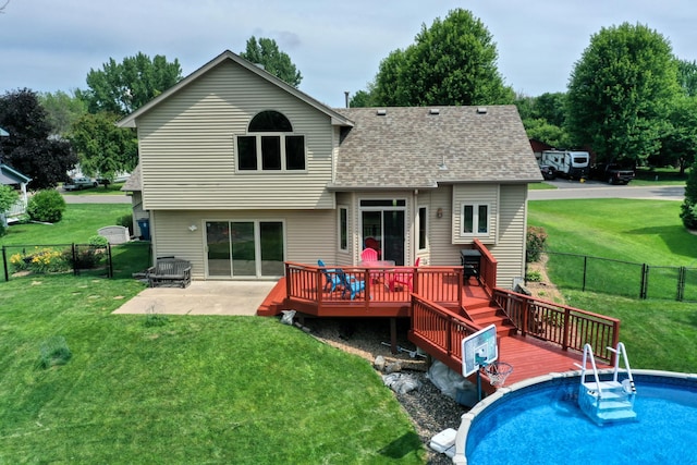 20730 Glenbrook Ave N, Forest Lake, MN 55025 - back of property featuring a wooden deck, roof with shingles, and a fenced backyard