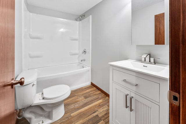 55170 Forest Blvd, Rush City, MN 55069 - full bathroom with vanity,  shower combination, and wood finished floors