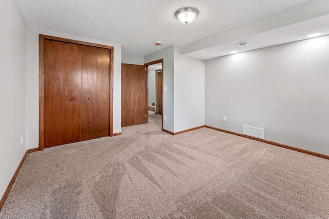 55170 Forest Blvd, Rush City, MN 55069 - unfurnished bedroom with carpet and a closet