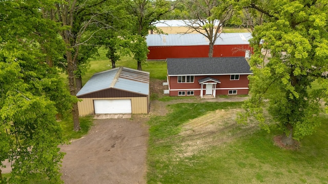 55170 Forest Blvd, Rush City, MN 55069 - view of front of house with an outbuilding, a front lawn, and driveway