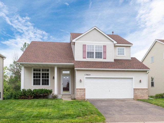 17625 48th Pl N, Plymouth, MN 55446 - traditional-style house featuring asphalt driveway, a front lawn, a garage, roof with shingles, and brick siding