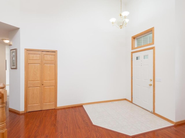 17625 48th Pl N, Plymouth, MN 55446 - foyer with a chandelier and light wood-type flooring