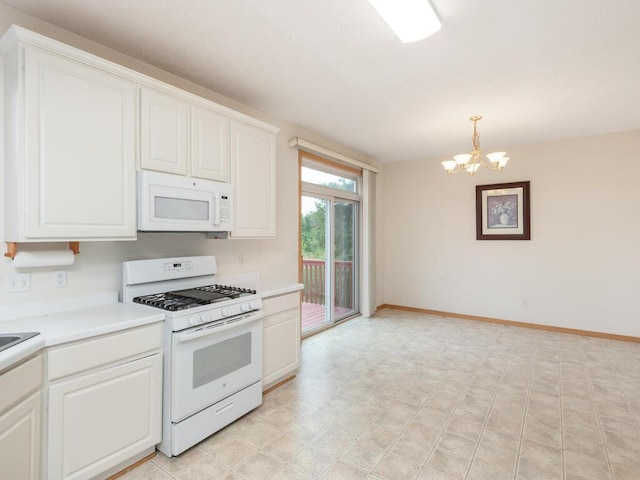 17625 48th Pl N, Plymouth, MN 55446 - kitchen with white appliances, a chandelier, white cabinets, light countertops, and pendant lighting