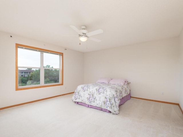17625 48th Pl N, Plymouth, MN 55446 - carpeted bedroom featuring baseboards and ceiling fan
