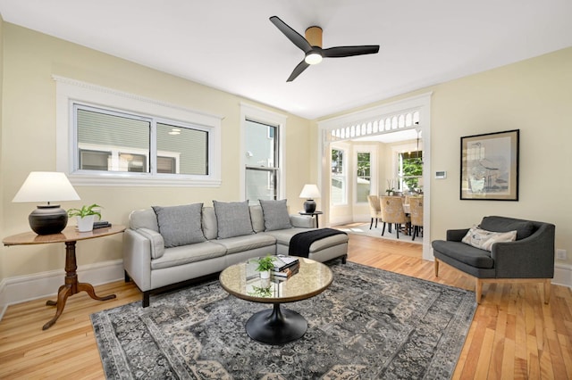 2636 Harriet Ave, Minneapolis, MN 55408 - living room featuring light wood-style flooring and a ceiling fan